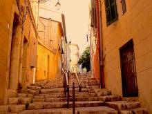 Admiring the vibrant street art that adorns Marseille's walls, showcasing the city's creative spirit
