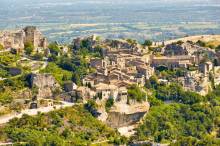 Savoring the breathtaking panoramas from the heights of Les Baux-de-Provence, where vistas of rolling hills and distant villages unfold
